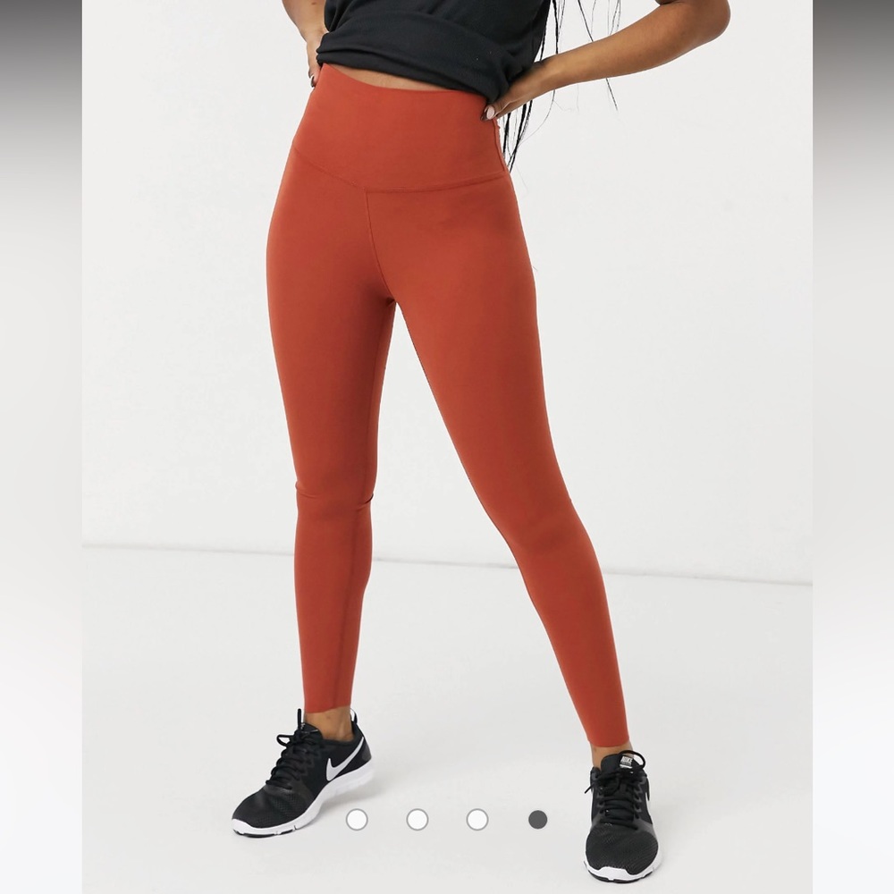 Nike yoga luxe 7/8 leggings in rust orange, Small